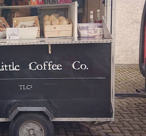 Handmade scones and treats in wooden crates at The Little Coffee Co hatch